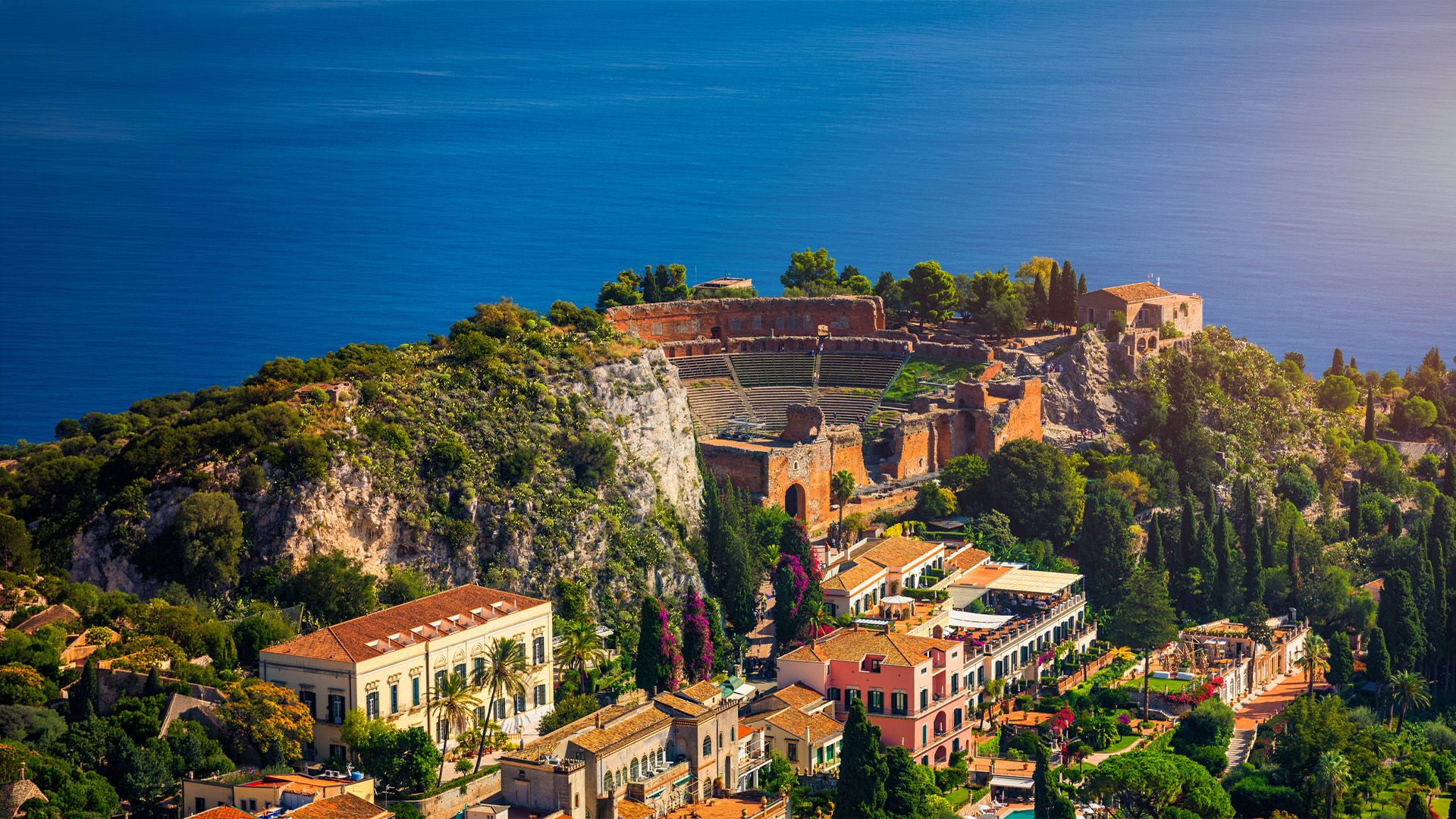 Ruins of Ancient Greek theater in Taormina, Sicily, Italy. Taormina located in Metropolitan City of Messina, on east coast of island of Sicily