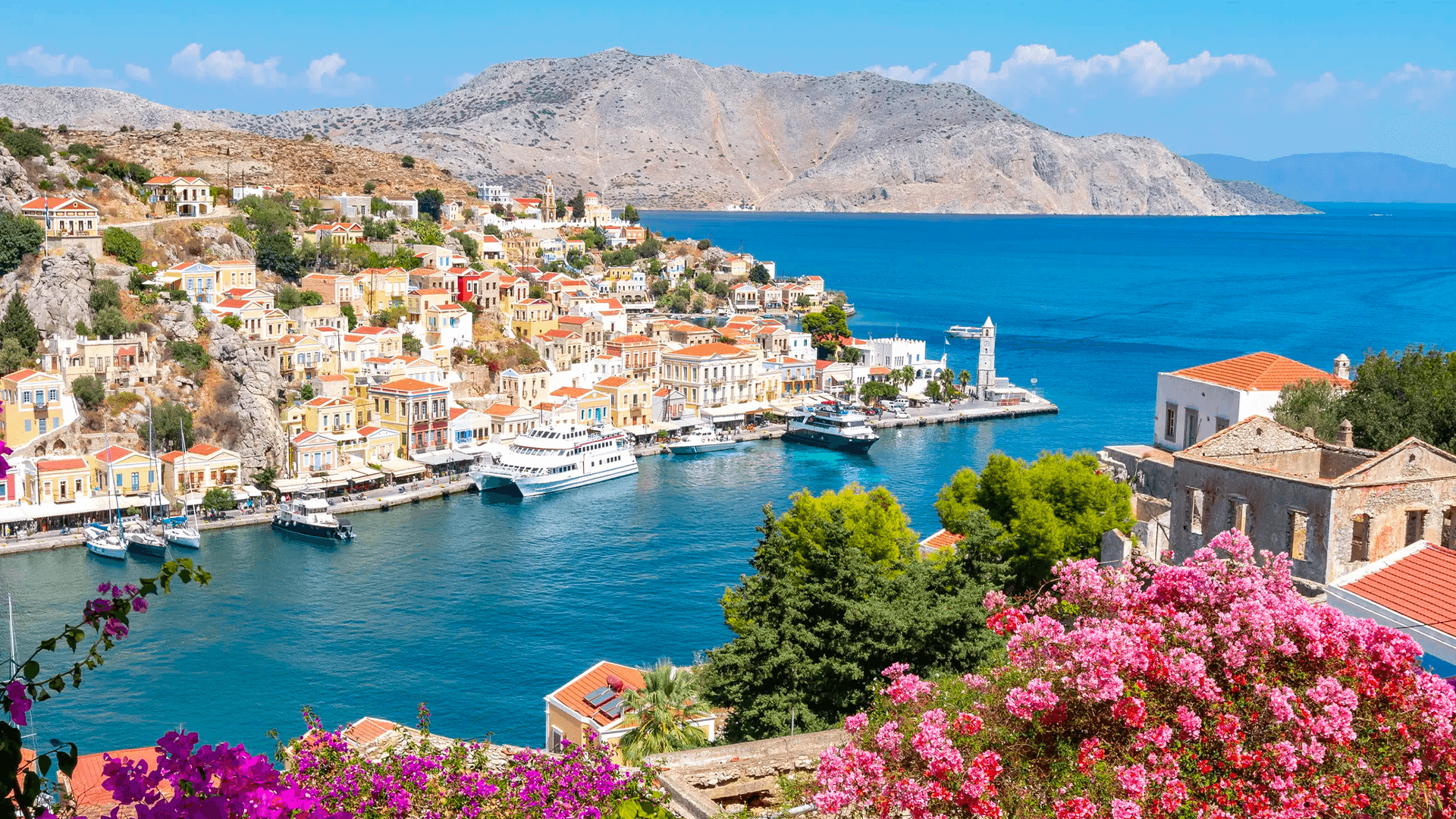 Neoclassical houses above the harbor at Symi, a short sail from Rhodes